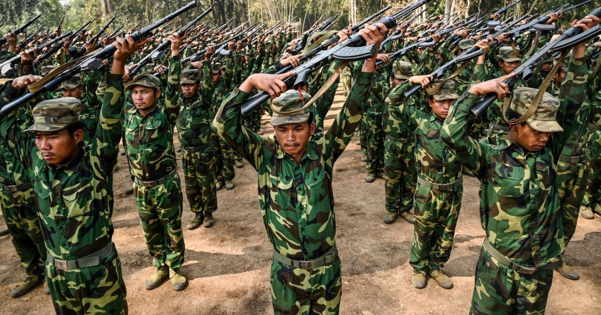 Ethnic fighters battling way into key north Myanmar town