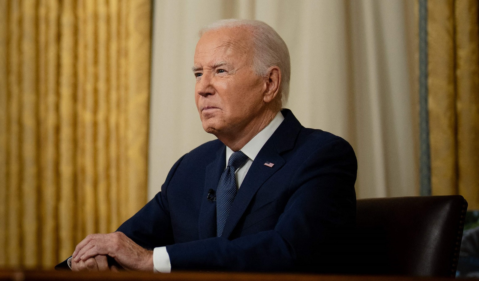 Biden tells Americans to 'cool it down' after Trump assassination bid