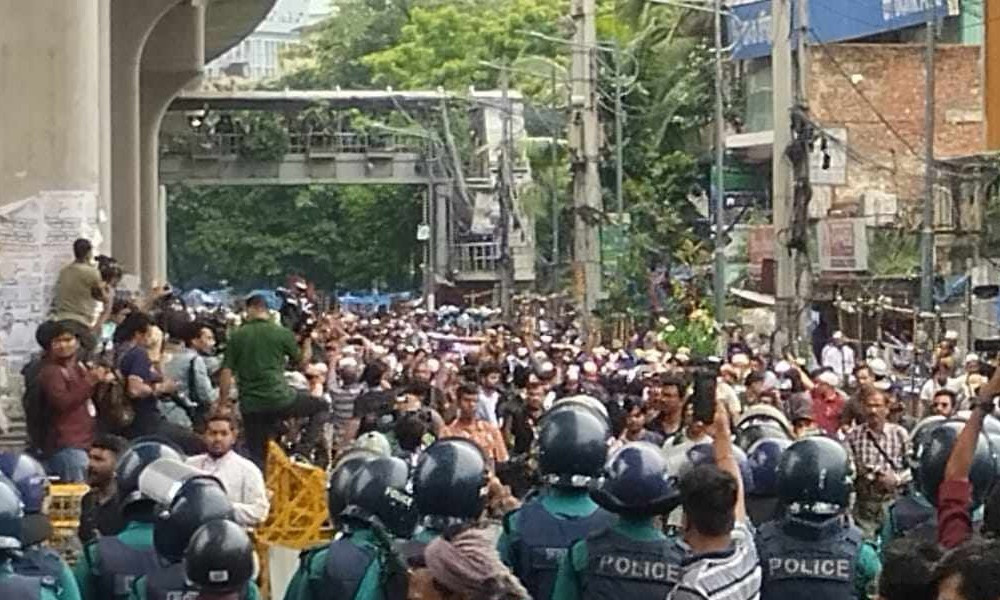 People bring out procession from national mosque