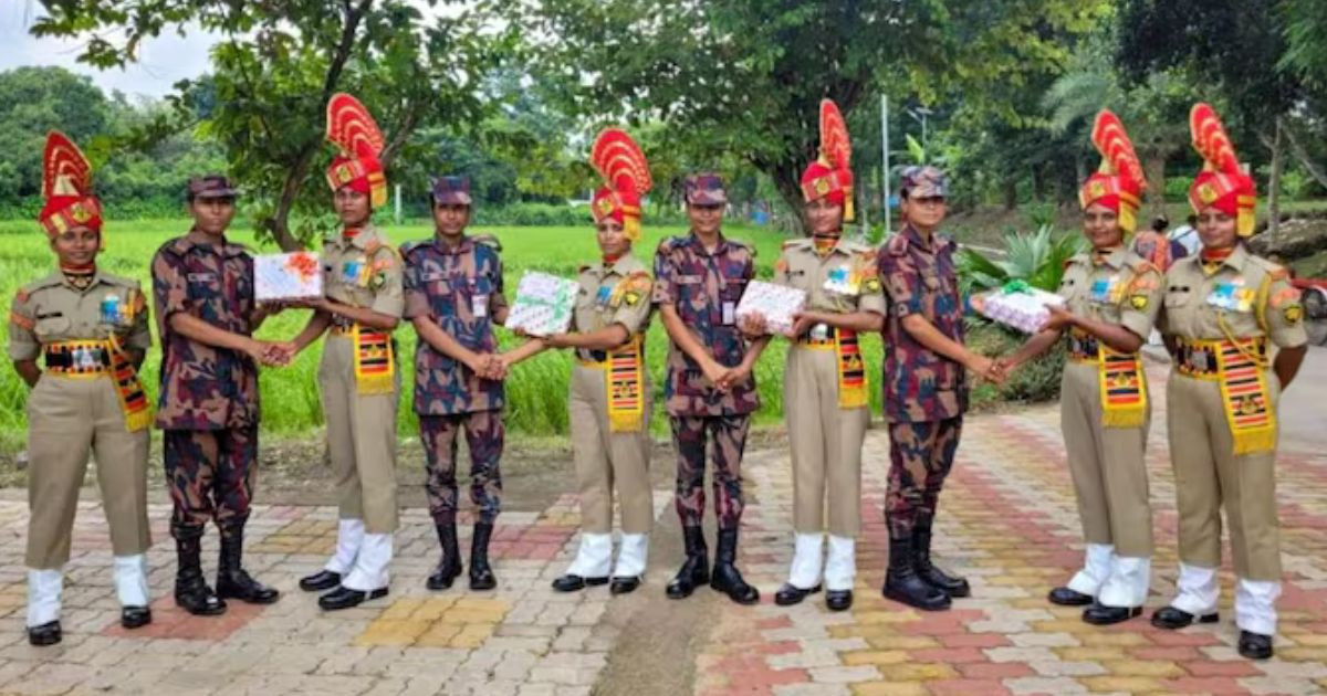 All-women BSF team gives sweets to all-lady BGB team
