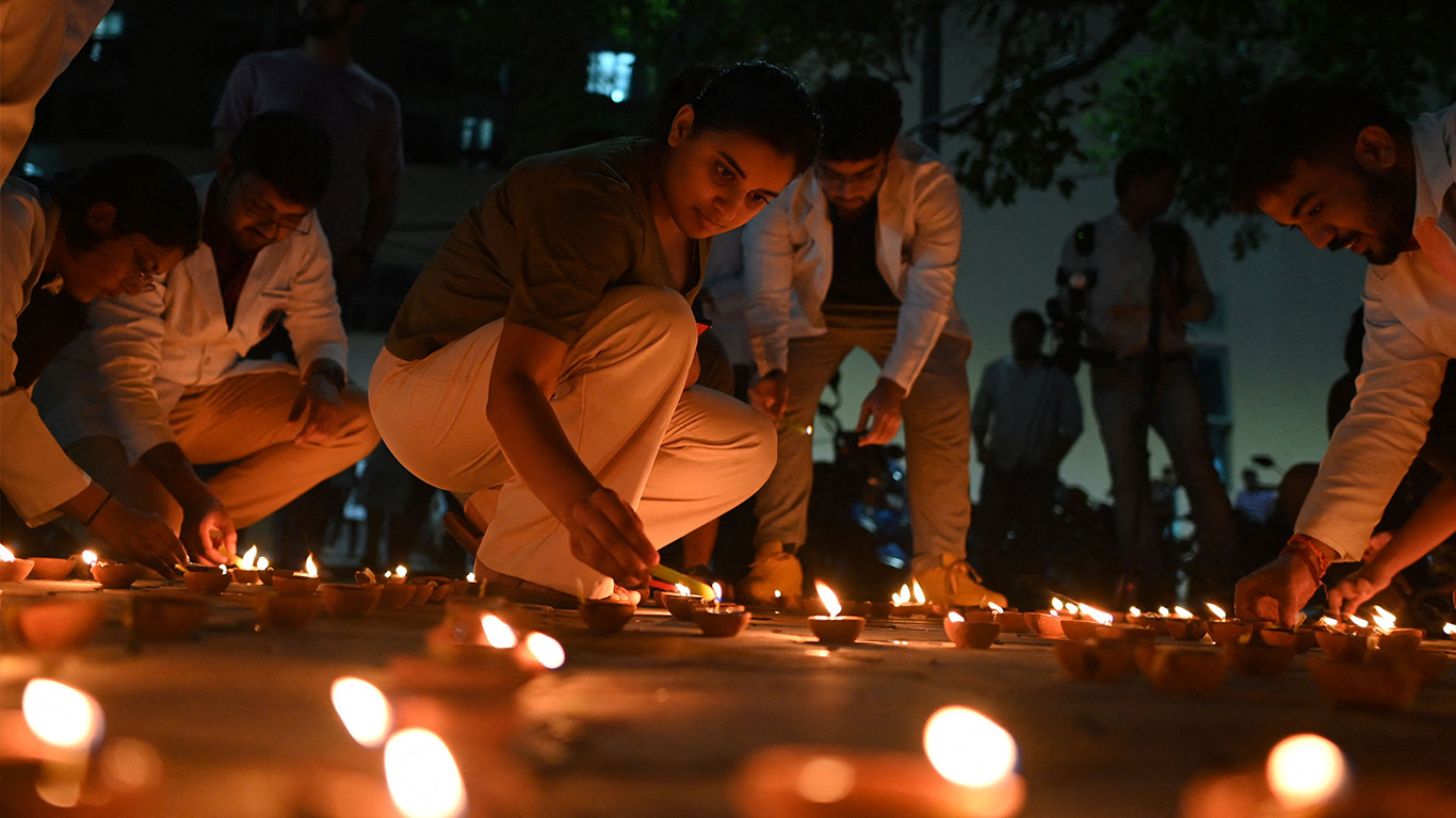 Indians demand justice in candlelight march for murdered doctor