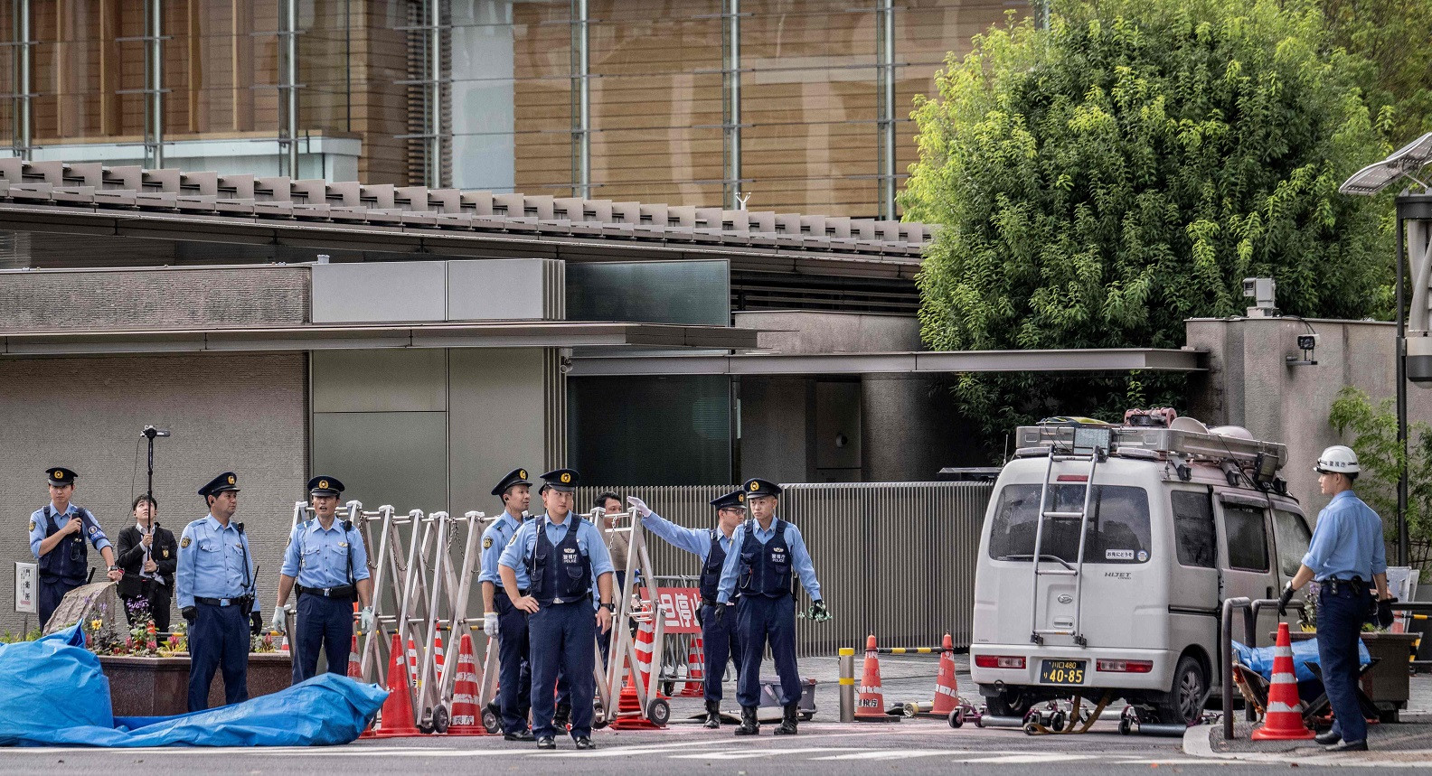 Japan's ruling party headquarters is attacked with firebombs and suspect is arrested