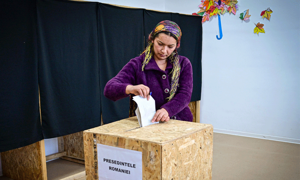 Far-right candidate surprises in Romania elections, setting up run-off with PM