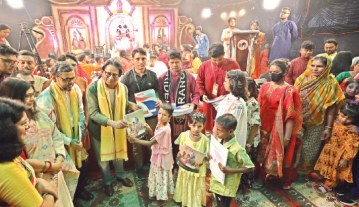 Underprivileged kids get Bashundhara exercise books on Saraswati Puja