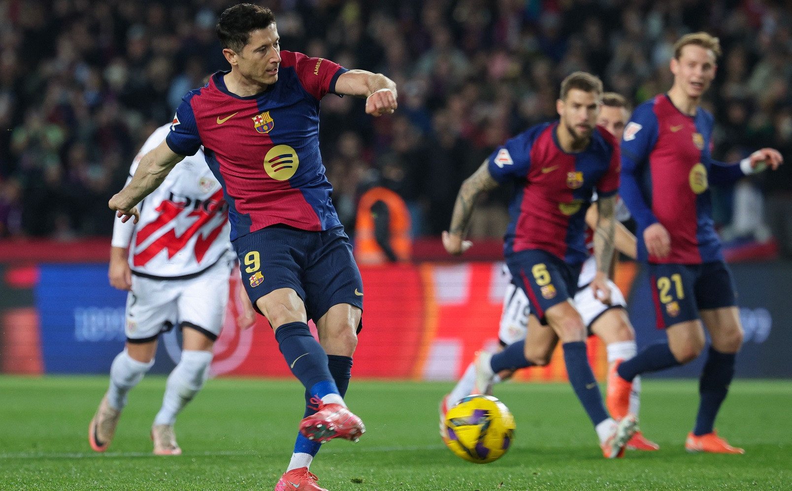 Lewandowski lifts Barcelona past Rayo and into Liga lead
