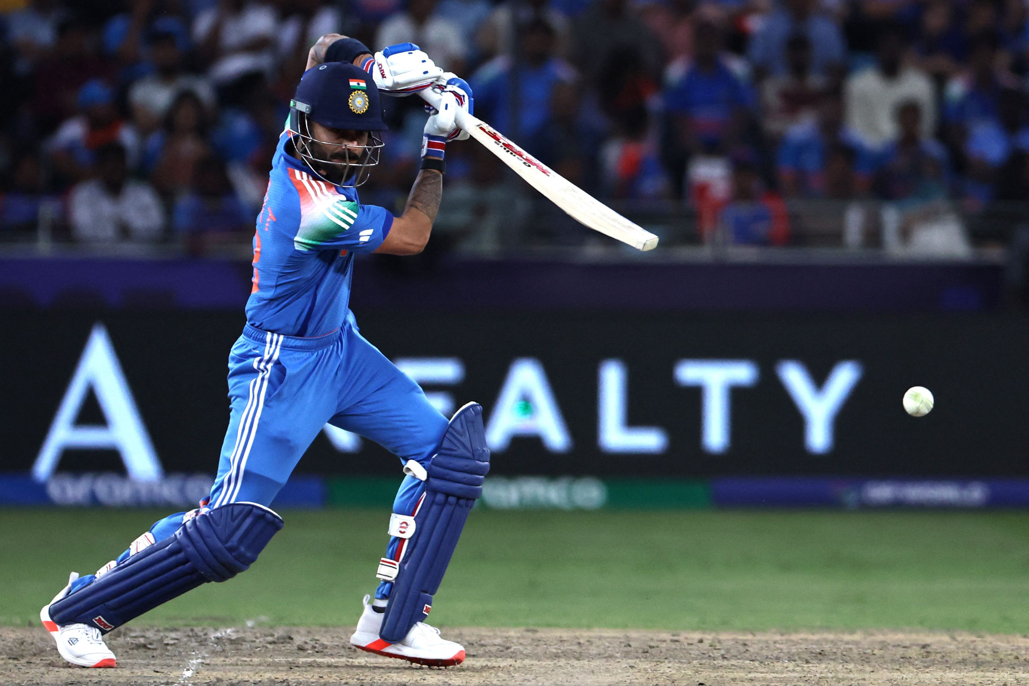 Kohli helps India beat Australia to reach Champions Trophy final