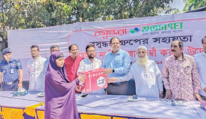 Twenty women get sewing machines in Saidpur