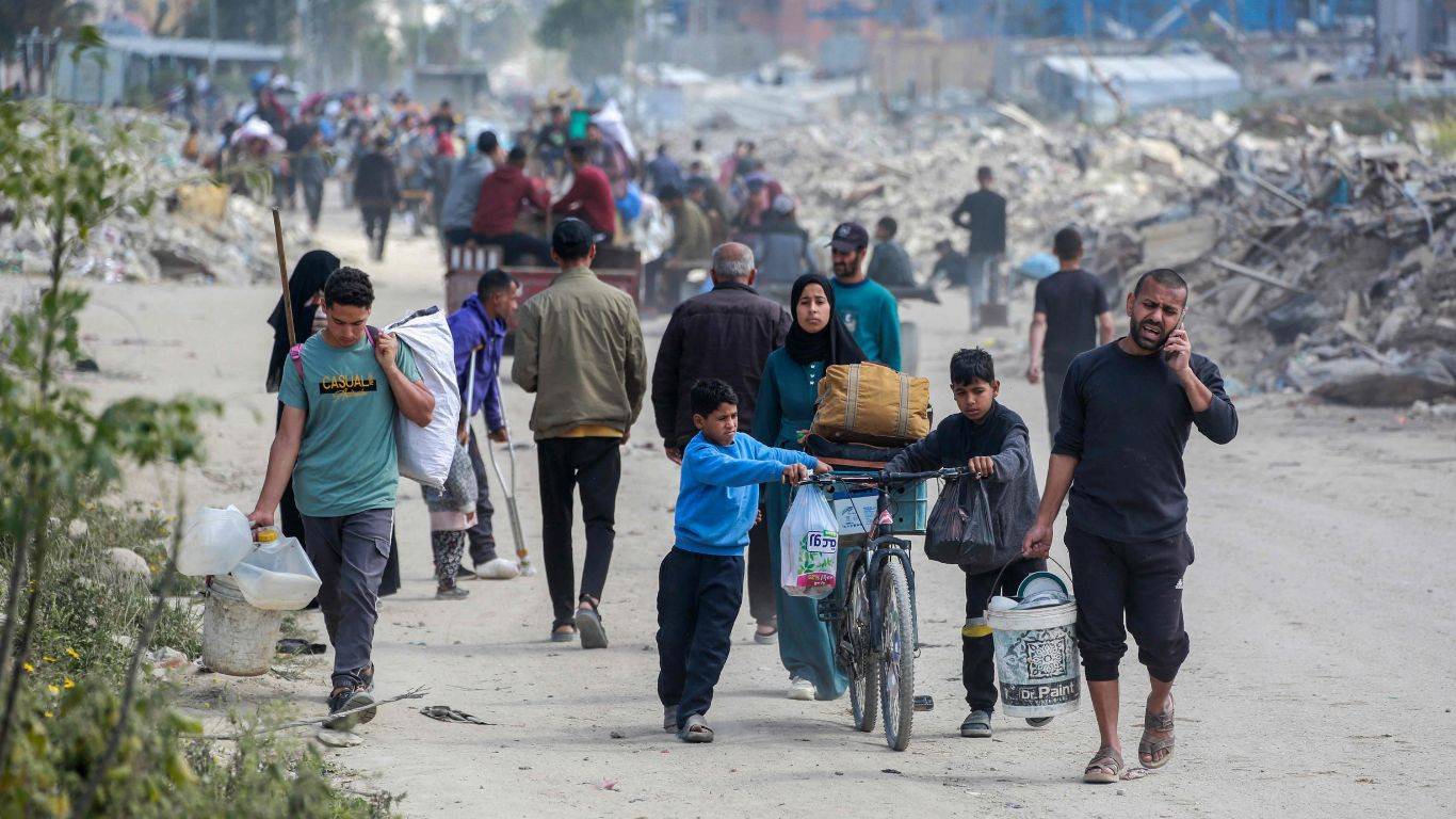 Fleeing civilians fill Gaza roads as Israel keeps up strikes