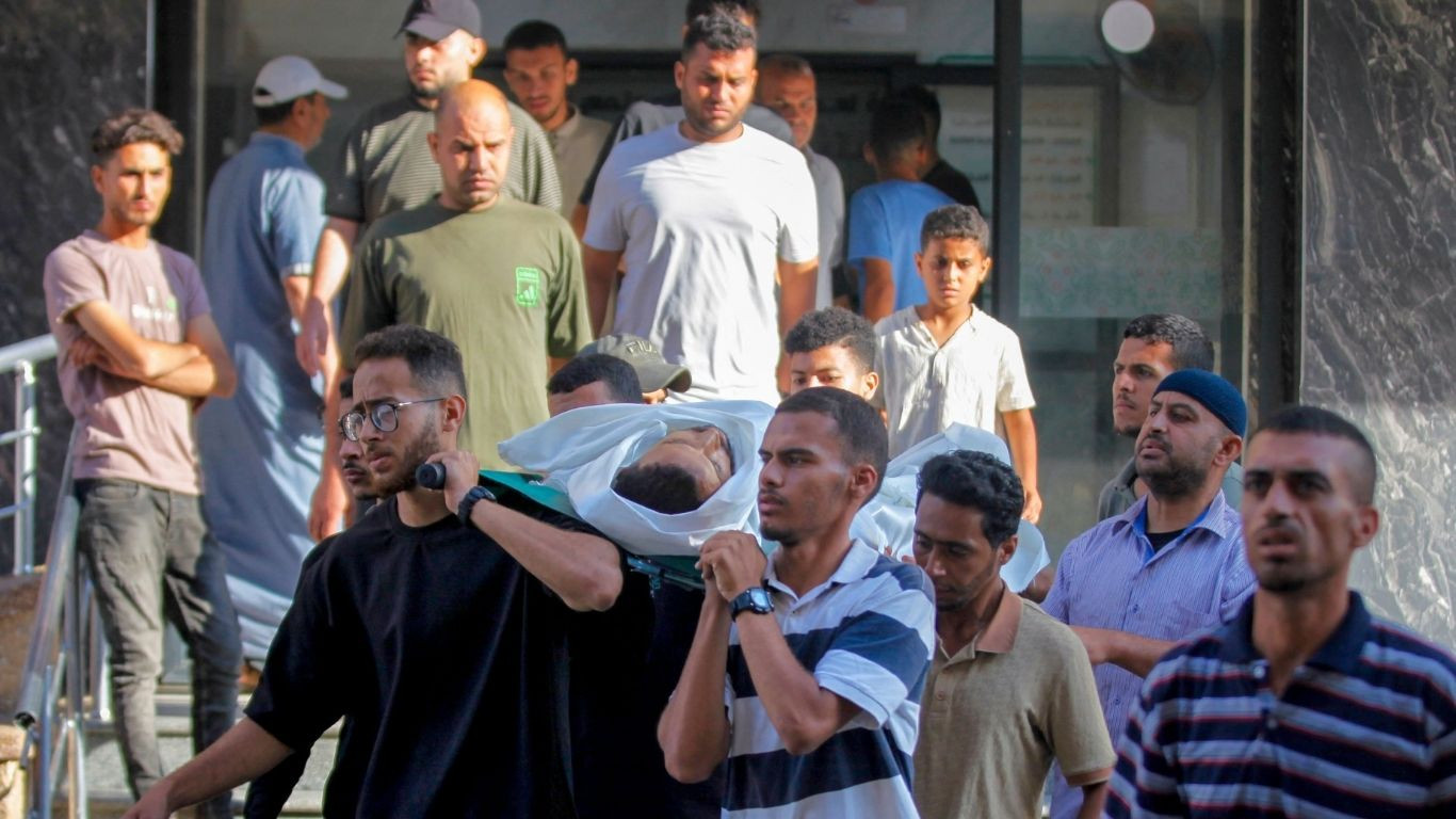 Gaza rescuers say Israeli forces kill 60, half near aid centres