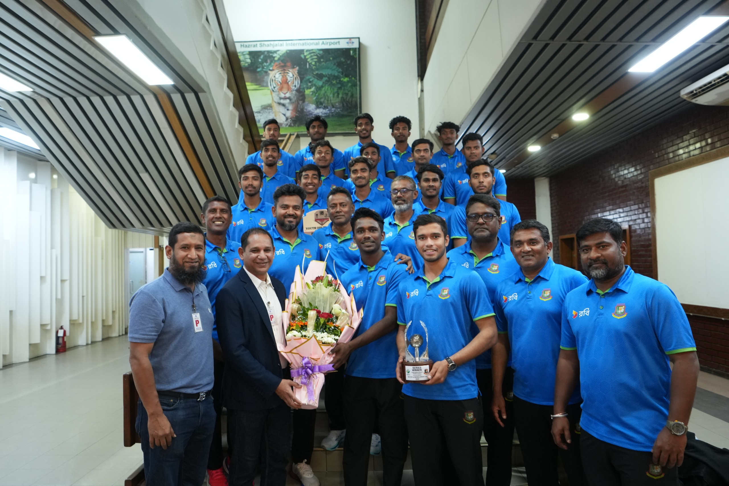 Triumphant Junior Tigers return home