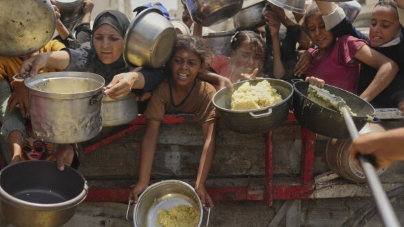 Baby girl killed with parents in Gaza airstrike as Israelis urge a mass protest over the war