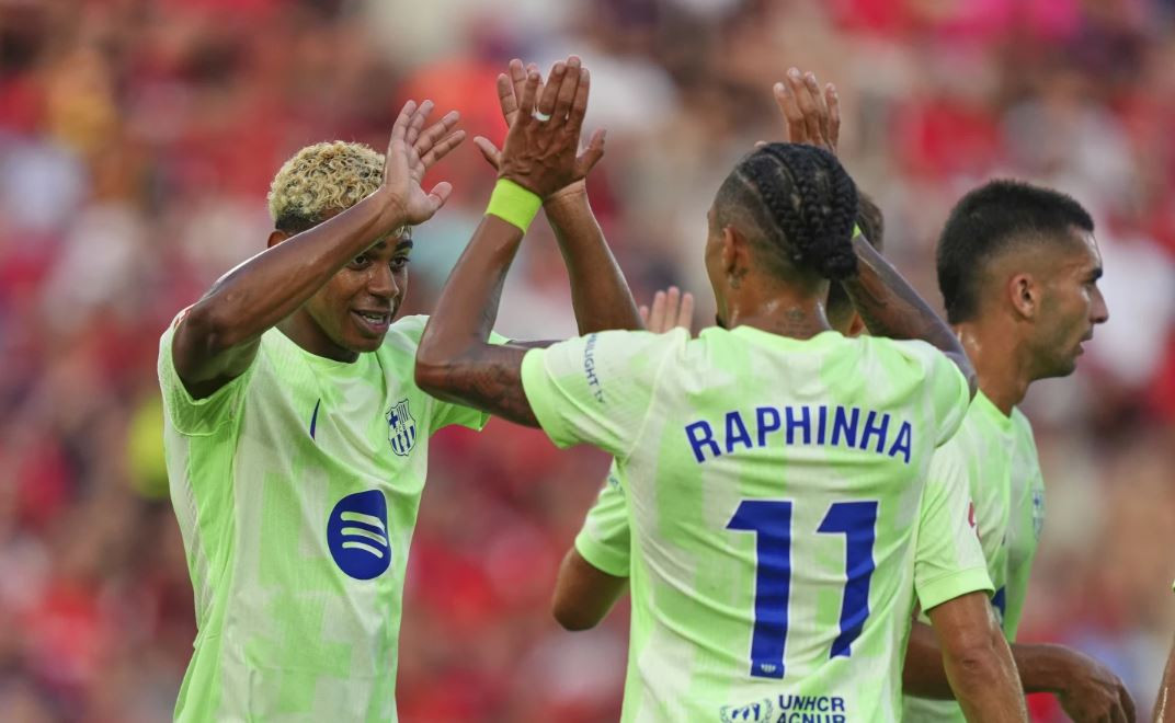Raphinha, Yamal score as Barcelona starts title defence beating Mallorca