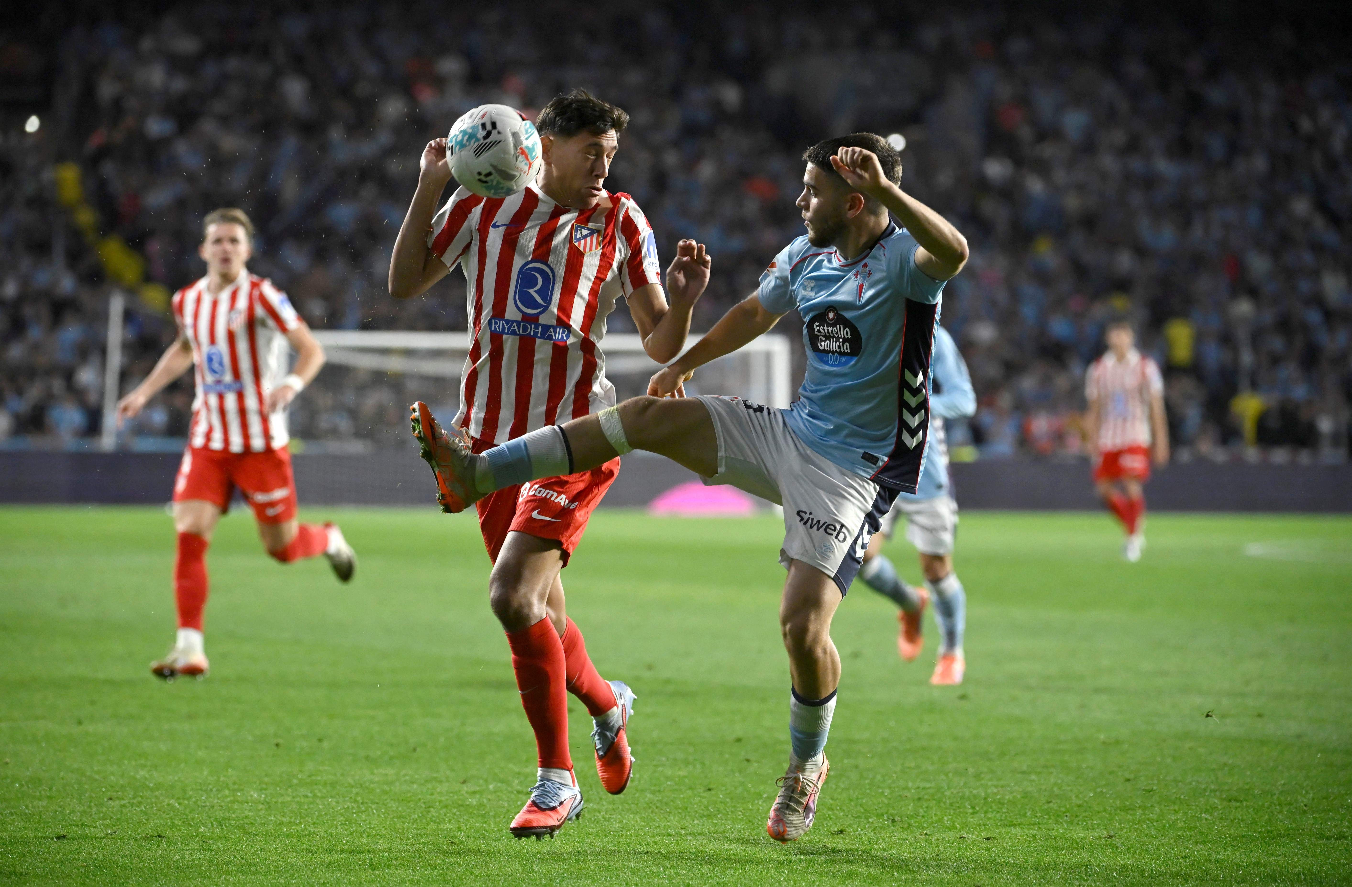 Atletico draw at Celta Vigo after Lenglet red card