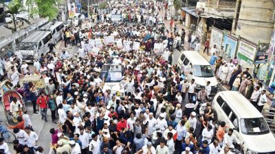 BNP MP aspirant Ishraque Hossain takes part in a mass contact in the Dhaka-6 constituency on Friday.  	-DAILY SUN PHOTO