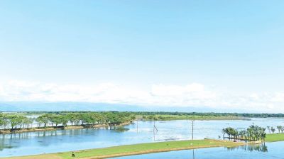 The water levels in the haor areas of Sunamganj are receding as winter approaches, rekindling hope among farmers. Many cultivators have begun preparing seedbeds ahead of the Boro season, while others are marking land boundaries or ploughing fields with tractors along the banks of Shani Haor and Kharchar Haor. The photo was taken on Friday.	 – JAHANGIR ALAM