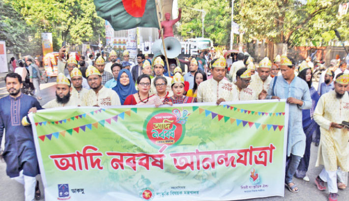 Dhaka University Central Students' Union (DUCSU) holds a procession at Dhaka University’s Faculty of Fine Arts on Sunday to celebrate ‘Adi Noboborsho Utsab’ on Pahela Agrahayan. -Daily sun Photo