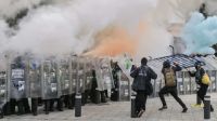 Clashes injure 120 at protest against Mexico president