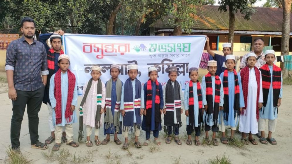 Orphaned students get winter clothes in Lalmai