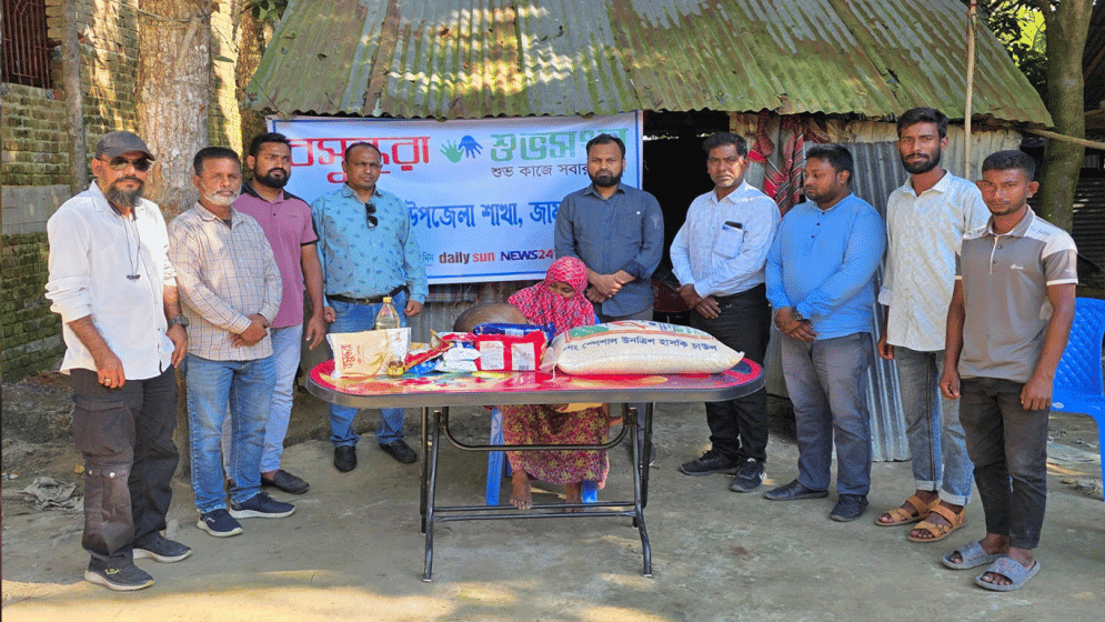 Bashundhara Shuvosangho stands beside ailing child in Jamalpur