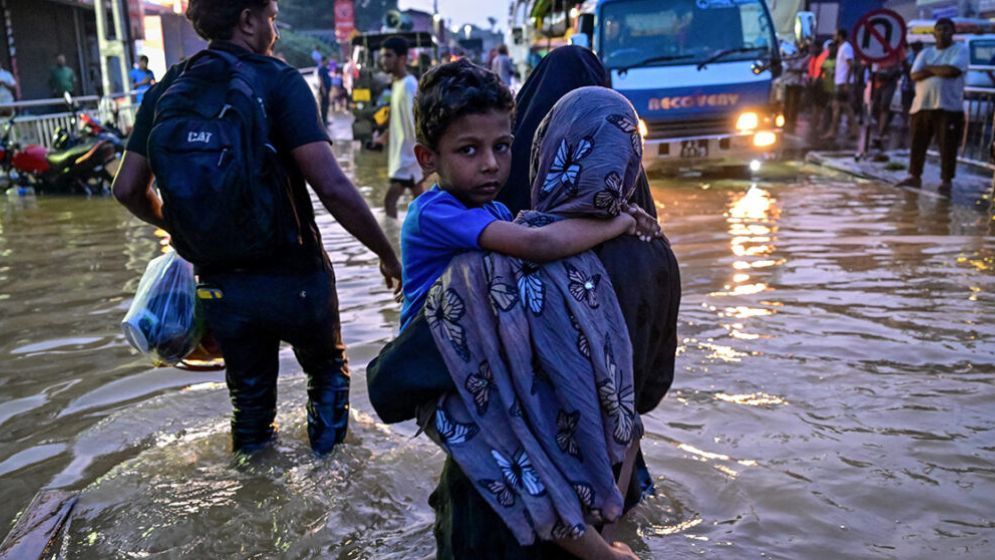 Race to get aid to Asia flood survivors as toll nears 1,200