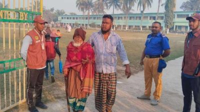 Hekmat Ali, 105, reaches polling station with son to vote