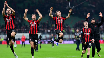 Milan edge Inter in derby to keep distant title chase alive