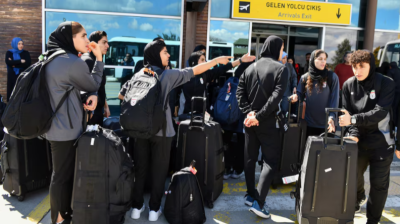 Iranian women's football team arrive back in Iran