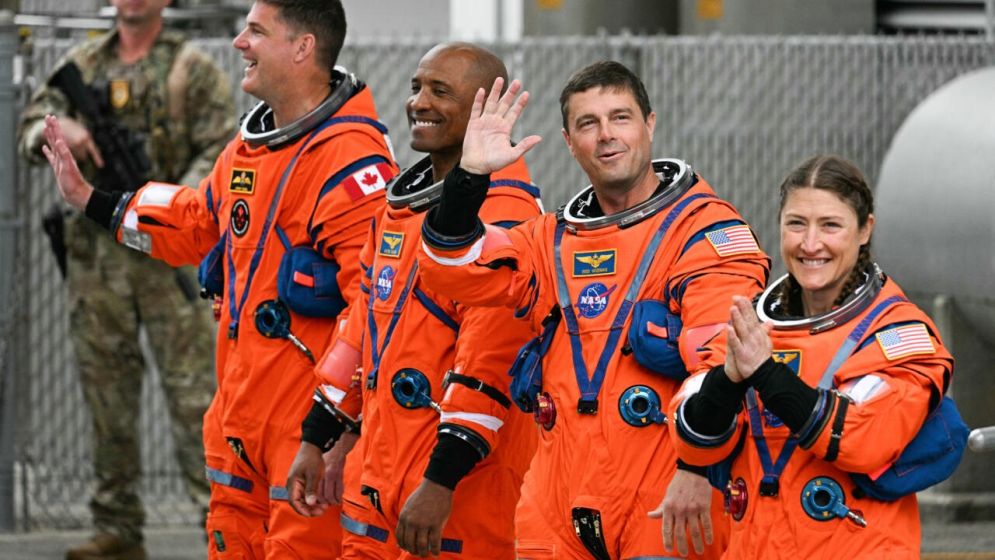 Astronauts strapped in for historic US lunar launch