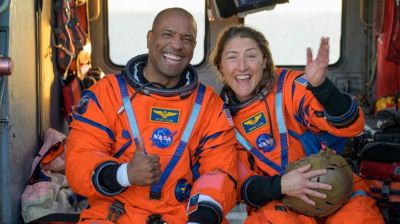 Circling the moon, a Black astronaut inspires millions