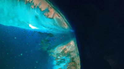 China moves to block entrance to disputed South China Sea shoal