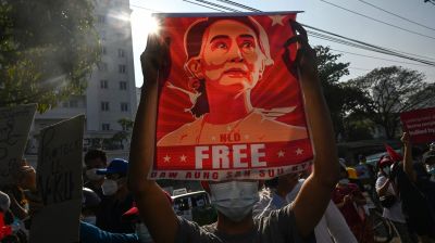 Myanmar reduces Suu Kyi's sentence, frees former president