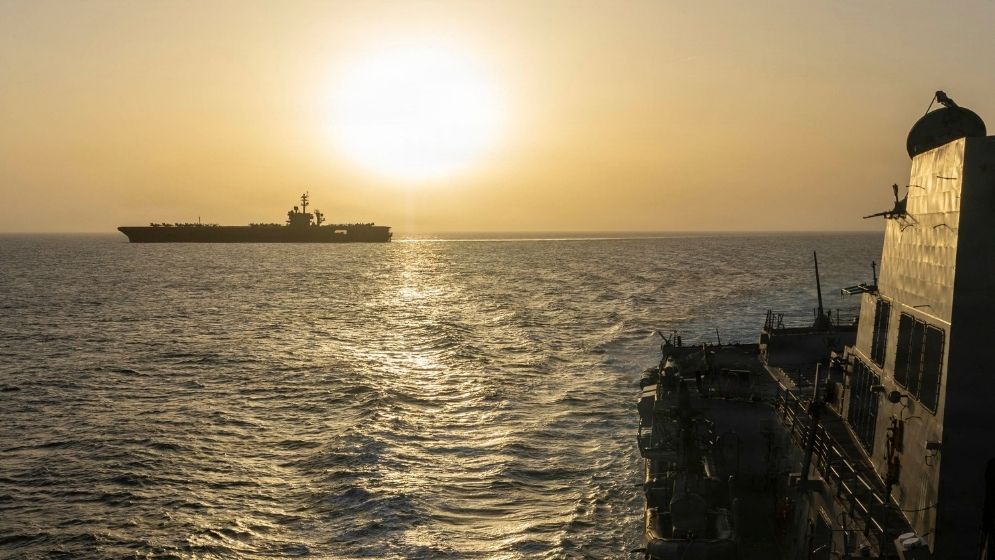 US destroyer fires on, seizes Iran cargo ship trying to evade blockade
