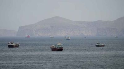 Iran tightens control of Hormuz after US calls off renewed attacks