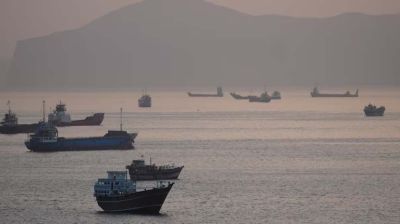 Iran hits ships and UAE oil port in show of force after Trump orders Navy to open strait