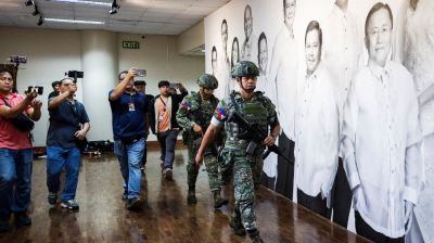 Gunshots fired in standoff at Philippine Senate over ICC suspect