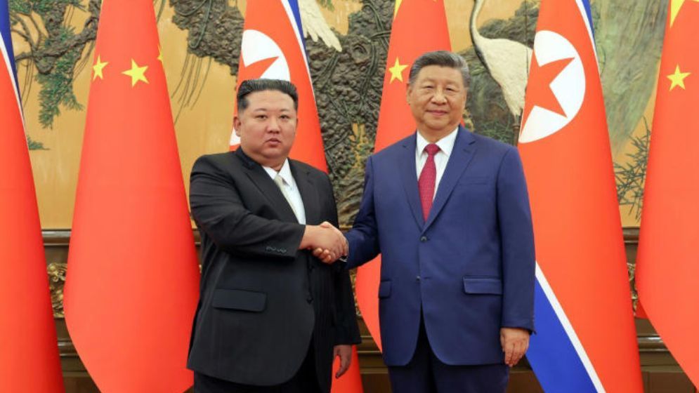 Xi lands in North Korea for rare visit