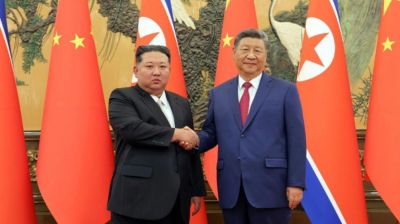 Xi lands in North Korea for rare visit