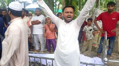 Father's body lies in yard as children clash over property share