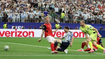 Magic Messi makes World Cup history to send Argentina into last 32
