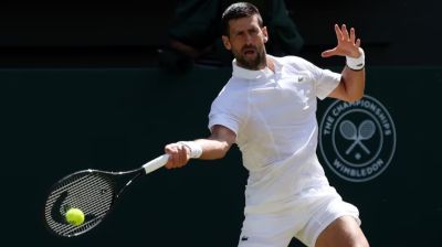 Djokovic moves past another Federer milestone to make quarters
