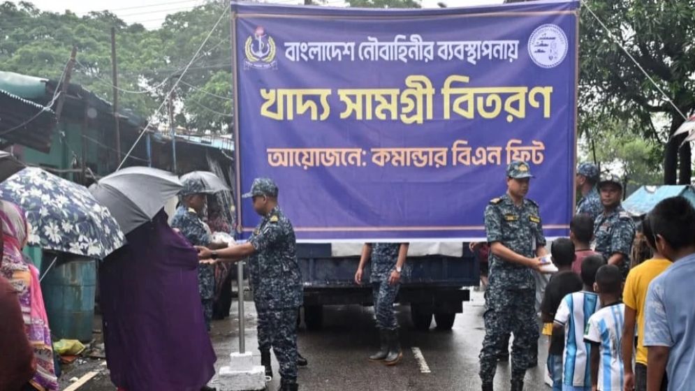 Navy distributes cooked food among flood-hit families in Chattogram
