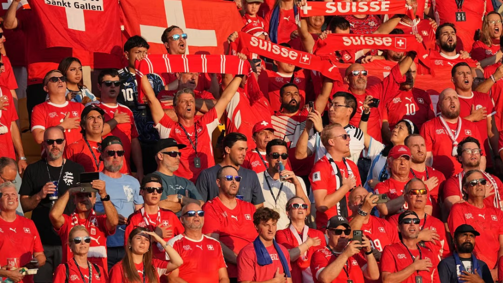 Swiss fans salute team
