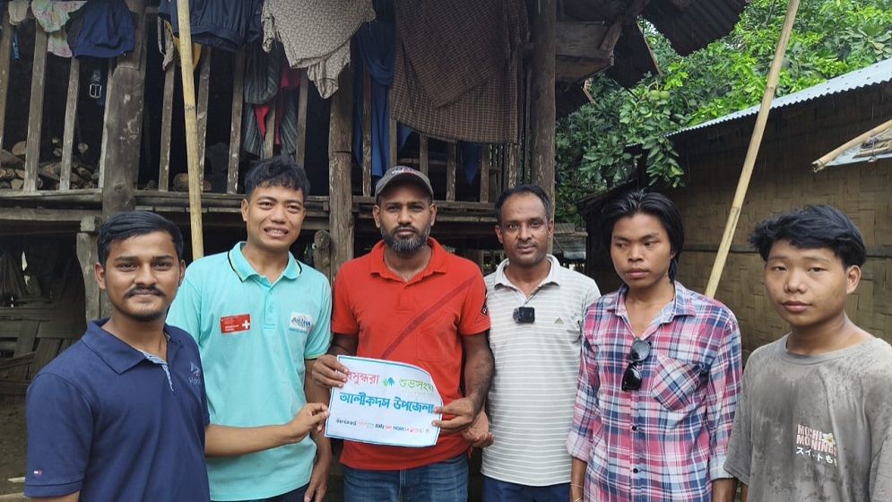 Flood-hit people get relief in remote Bandarban hills