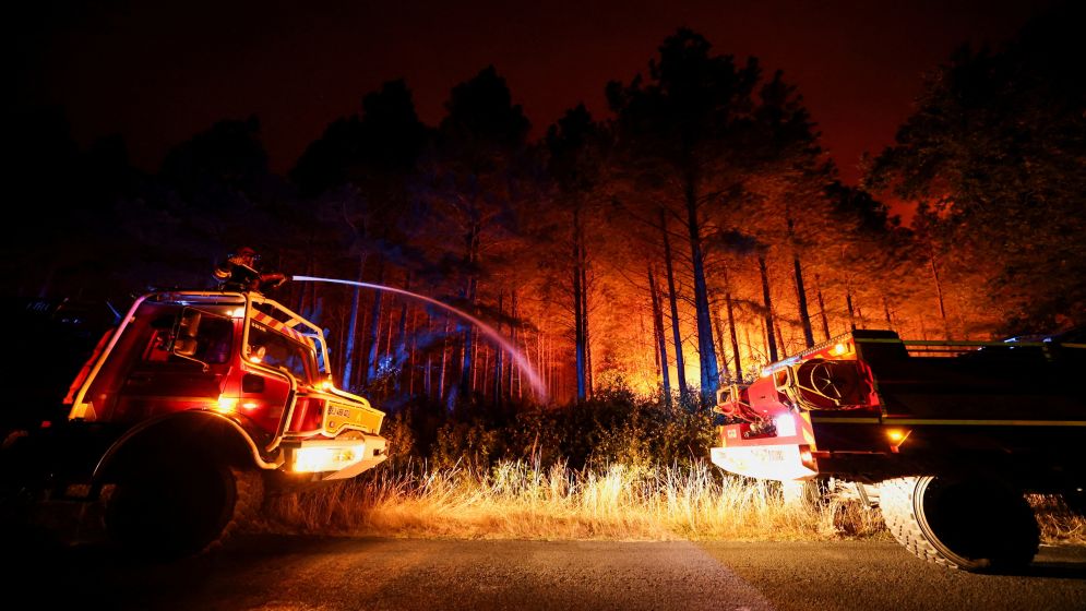 France wildfire forces thousands to flee, severe heatwave continues in Europe