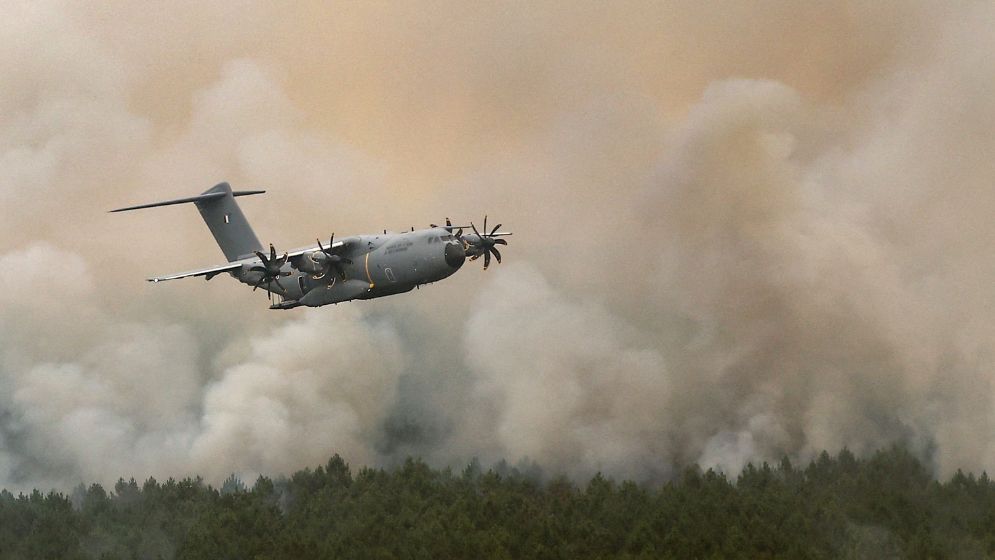 Devastating wildfires send 267,000 fleeing in France and Spain