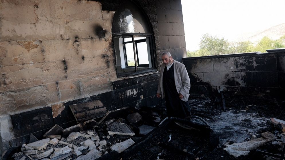 Israeli settlers set fire to West Bank mosques after deadly clash