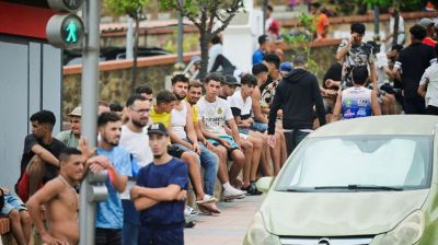 Spain says migrants are returning from Ceuta after 57 die in border rush