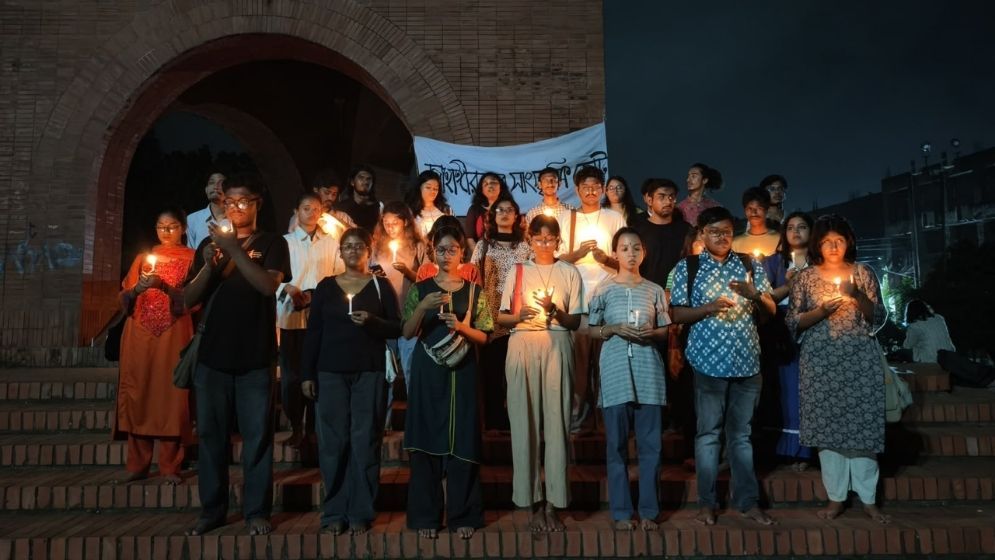 JU students hold silent march, candlelight vigil against sexual violence