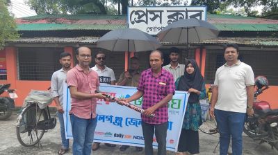Newspaper hawkers get umbrellas, waterproof bags in Gopalganj