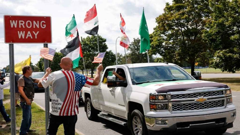 Palestinian-American hoists US flag on home besieged by settlers